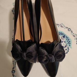 Black leather bow tie heels